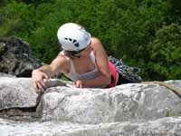 Jen reaching the top of Limelight. (Category:  Rock Climbing)