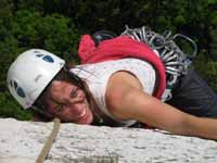 Jen making the crux move on Arrow. (Category:  Rock Climbing)