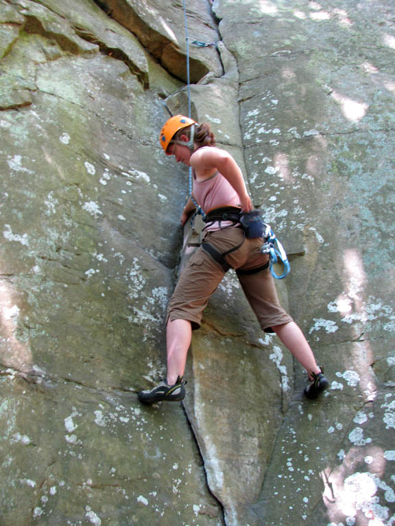 Jess cleaning Autumn. (Category:  Rock Climbing)