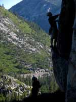 Melissa belaying Guy on the first pitch of Traveler Buttress. (Category:  Rock Climbing)