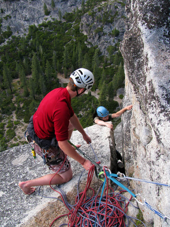 Guy belaying Melissa through the final bulge. (Category:  Rock Climbing)