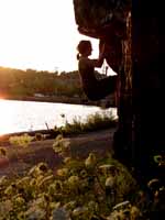 Jen bouldering as the sun sets. (Category:  Rock Climbing)