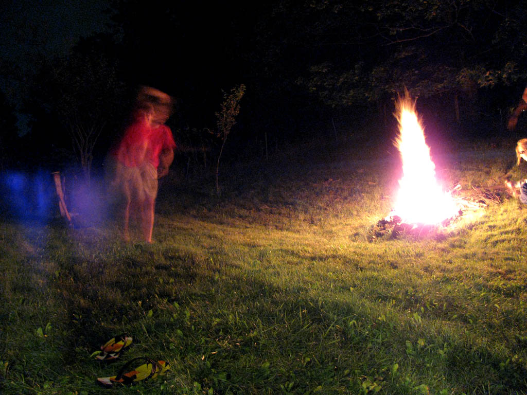 Slacklining by the fire. (Category:  Party)