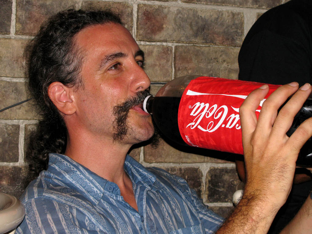 Mark didn't bring 40 bottles of soda this year, so he was really craving it by the time we went out for pizza in Quepos. (Category:  Travel)