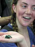 Hannah with a Black and Green Poison Dart Frog. (Category:  Travel)