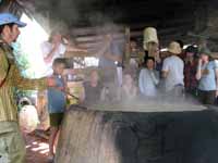 Dave explaining sugar making to the class. (Category:  Travel)