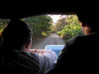 Jess and Joe in the front of the truck bringing us to Carate. (Category:  Travel)