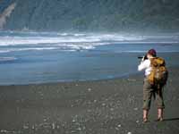 Jess getting a picture of the coast. (Category:  Travel)