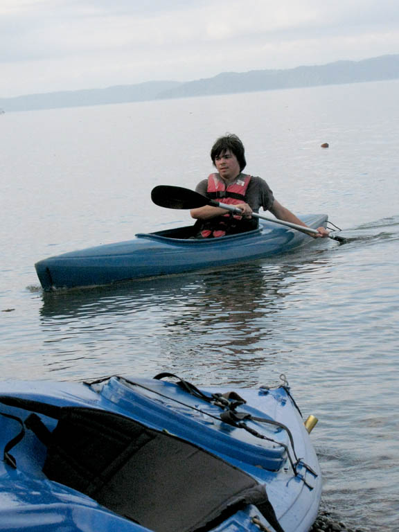 Joe reaching shore. (Category:  Travel)