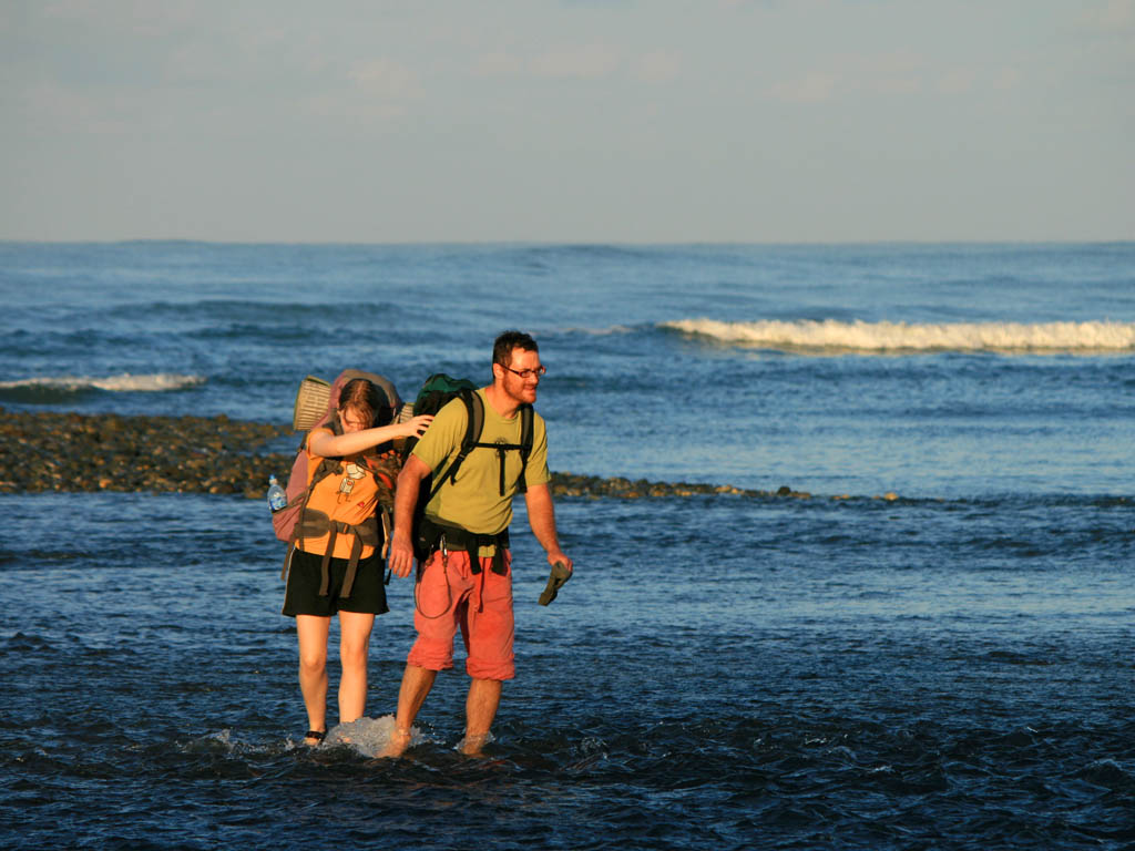 Alex and me crossing the Rio Claro. (Category:  Travel)