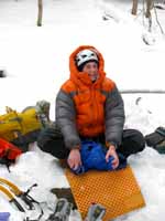 Guy staying warm. (Category:  Ice Climbing)