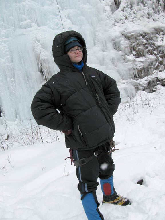 Emily wearing my puffy.  This jacket is big on me.  It easily fits over all my layers.  I think Emily could fit in one of the pockets. (Category:  Ice Climbing)