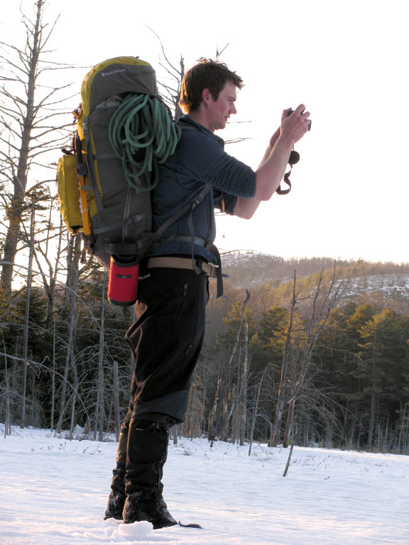 On the hike out, Guy getting pictures of Pharaoh. (Category:  Ice Climbing)