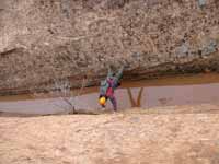 Full body stemming in the canyon. (Category:  Rock Climbing)