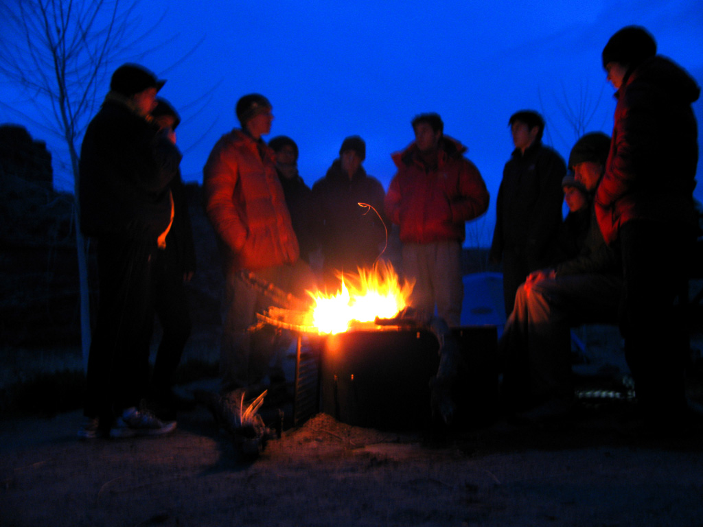 Everyone gathered around the campfire. (Category:  Rock Climbing)