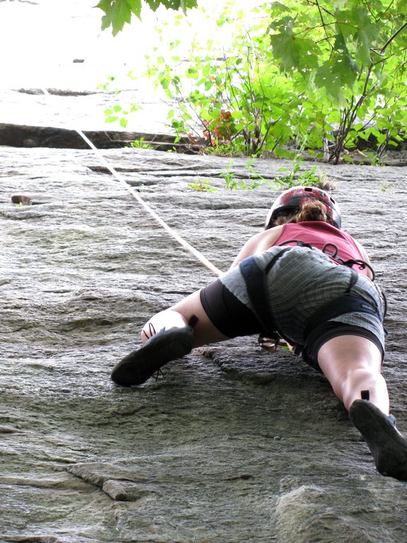 Liz pulling the crux of Snooky's. (Category:  Rock Climbing)