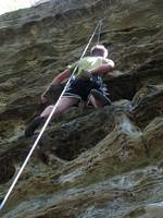 Guy climbing Johnny On Roofies. (Category:  Rock Climbing)