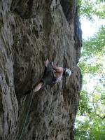 Me leading the crux of Burning Bush.  Crimp and crank. (Category:  Rock Climbing)