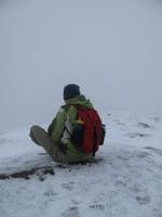 At the summit... why are you taking off your shoe? (Category:  Hiking)