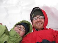 Lying down checking the length. (Category:  Camping)