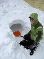 Starting to dig the quinzee.  I had piled the snow the day before so it would have plenty of time to set. (Category:  Camping)