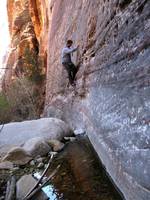 Jack bouldering at the base of Dark Shadows. (Category:  Rock Climbing)