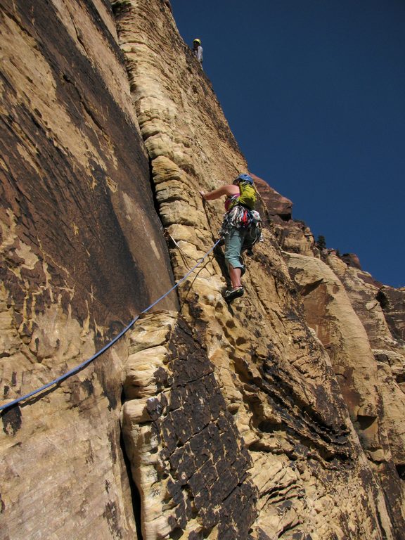 Zoe leading a pitch on Solar Slab. (Category:  Rock Climbing)