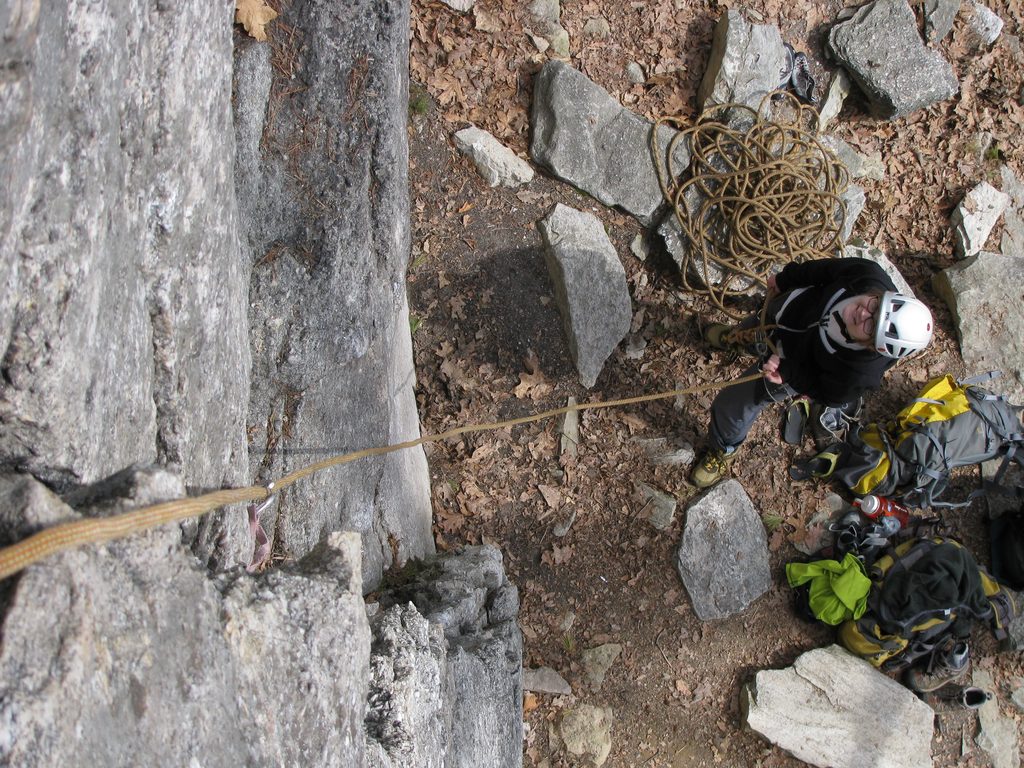 Emily belaying the first pitch of Something Interesting. (Category:  Rock Climbing)