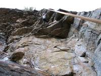 Emily onsighting the crux of Feast of Fools. (Category:  Rock Climbing)