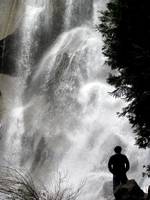 Collin at a waterfall. (Category:  Rock Climbing, Tree Climbing)