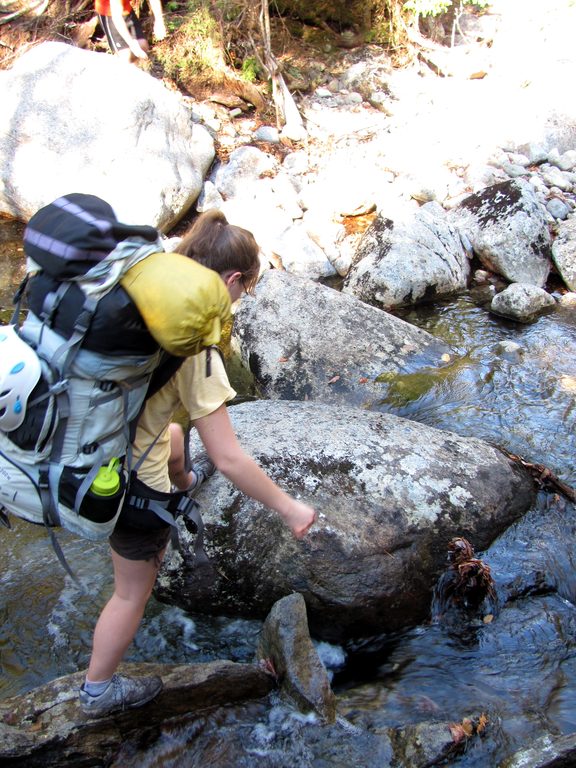 Katie crossing. (Category:  Rock Climbing)