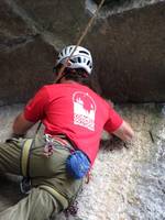 Me climbing Feast of Fools.  And modeling my COE Staff shirt. (Category:  Rock Climbing)