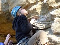 Emily leading the 5.9 start to the 5.7 climb Glory and Consequence. (Category:  Rock Climbing)