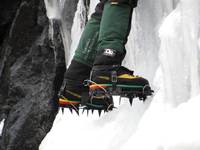 Emily climbing in her Sabertooth crampons, Tammy's old boots, and the gaiters she got at the COE gear sale a few years ago. (Category:  Ice Climbing)