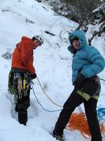 Guy getting ready to hike the first pitch on Eye Of The Needle. (Category:  Ice Climbing)