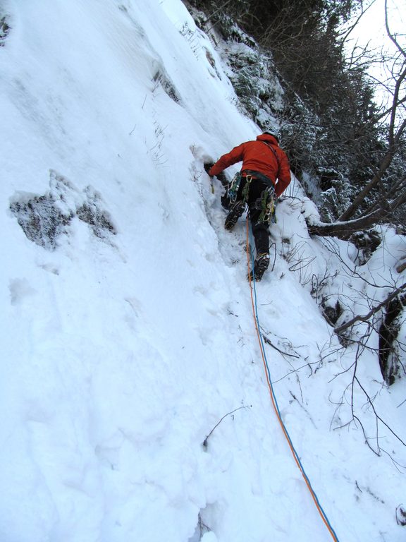 Guy leading the first pitch. (Category:  Ice Climbing)