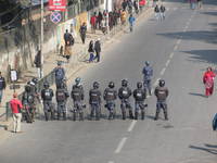 Police lining up to discourage protesters. (Category:  Travel)