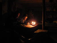 Josh and Dave enjoying our candlelit dinner. (Category:  Travel)