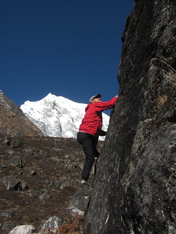 Me bouldering with Langtang Lirung in the background. (Category:  Travel)