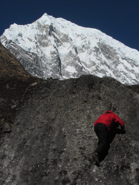 Me bouldering with Langtang Lirung in the background. (Category:  Travel)