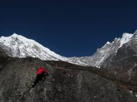 Me bouldering with Langtang Lirung in the background. (Category:  Travel)