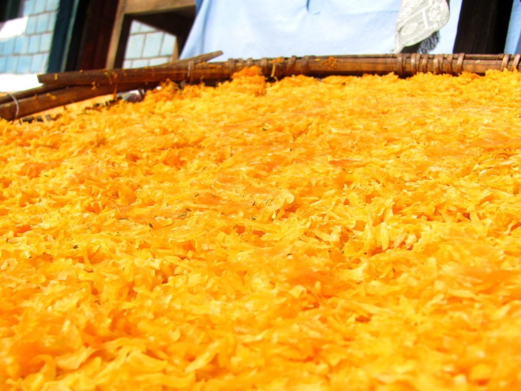 Shredded carrots drying in the sun. (Category:  Travel)