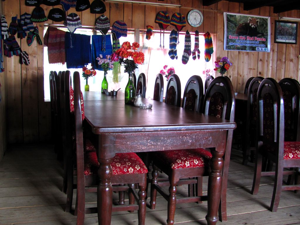 This heavy dining room furniture was carried by porters to a remote lodge in Laurebina. (Category:  Travel)