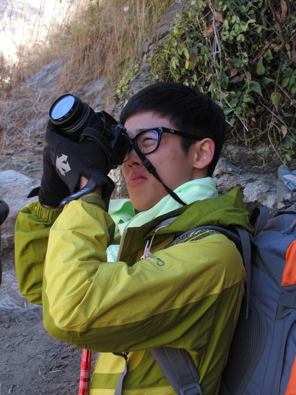 Young taking a picture (Category:  Travel)