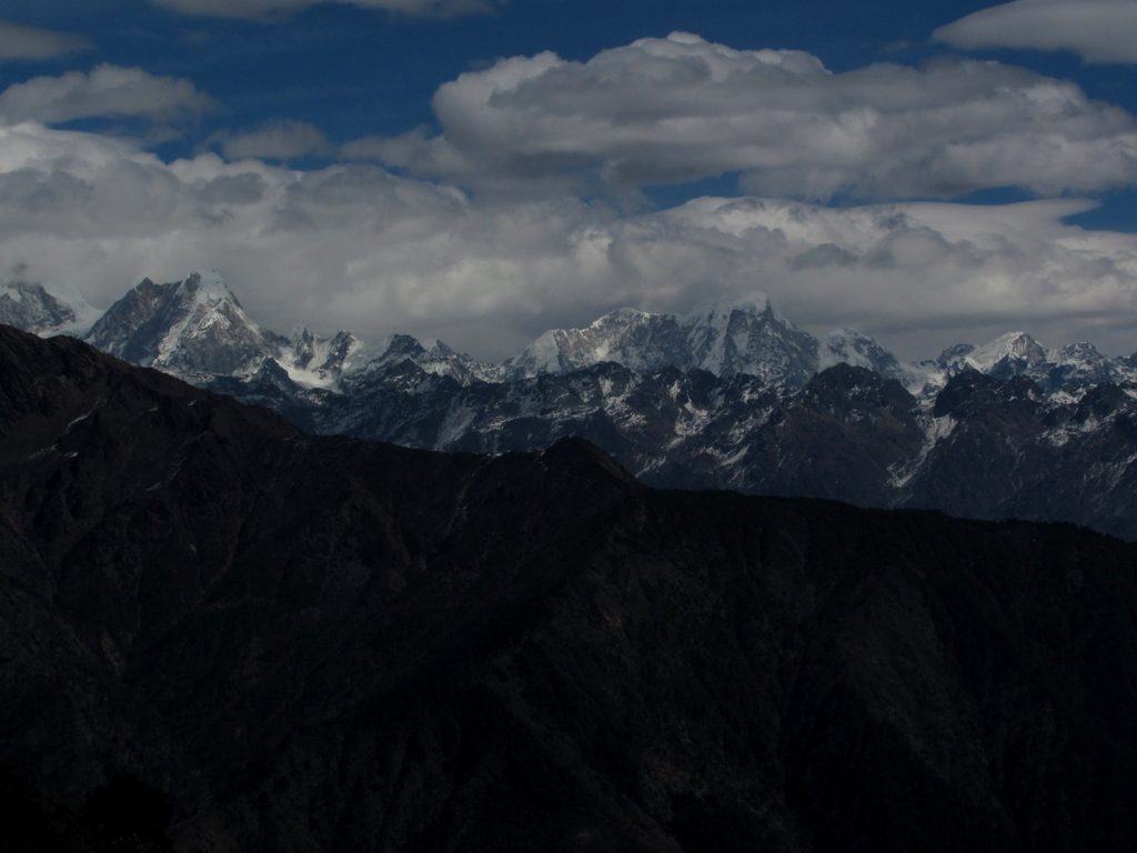 From this ridge, huge ranges of mountains are visible. (Category:  Travel)