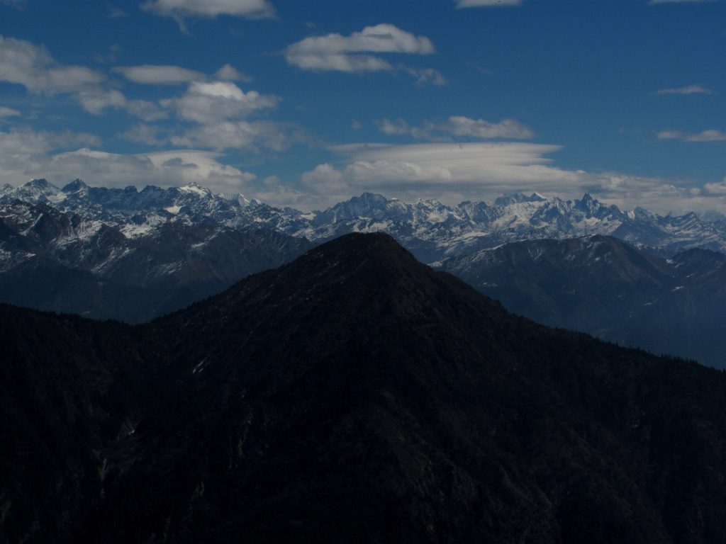 From this ridge, huge ranges of mountains are visible. (Category:  Travel)