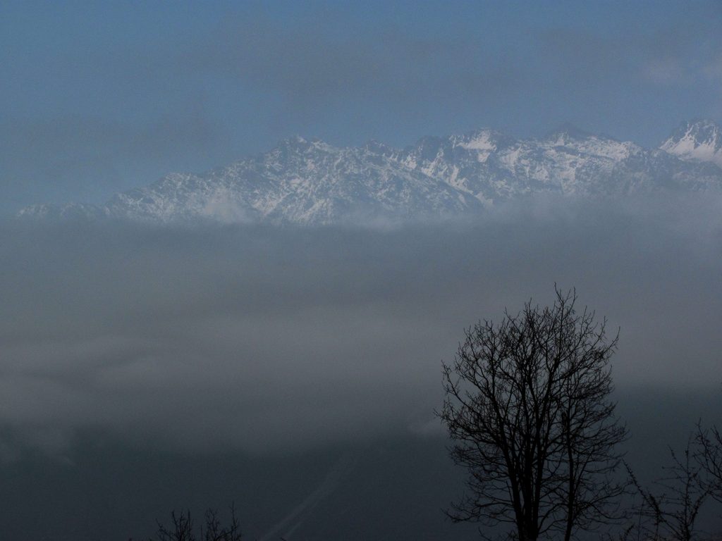 Mountains in the distance at dusk. (Category:  Travel)