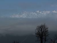 Mountains in the distance at dusk. (Category:  Travel)