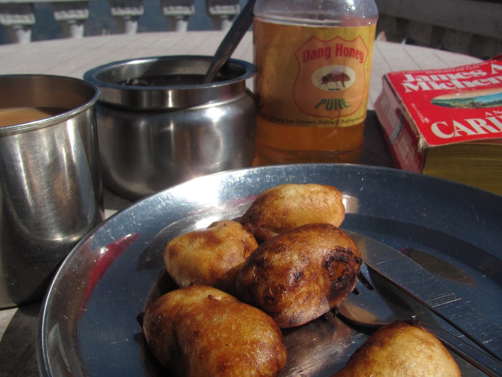 Apple fritters with honey; milk tea; a book.  Ahhhhhhhhh!!!!! (Category:  Travel)