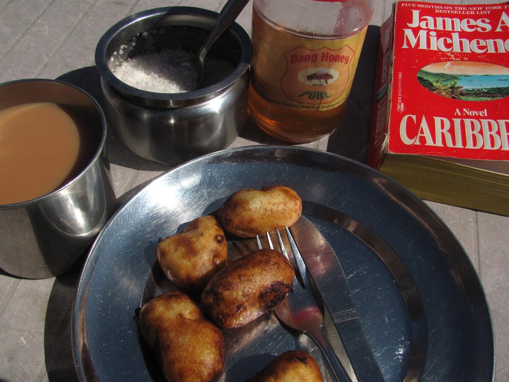 Apple fritters with honey; milk tea; a book.  Ahhhhhhhhh!!!!! (Category:  Travel)